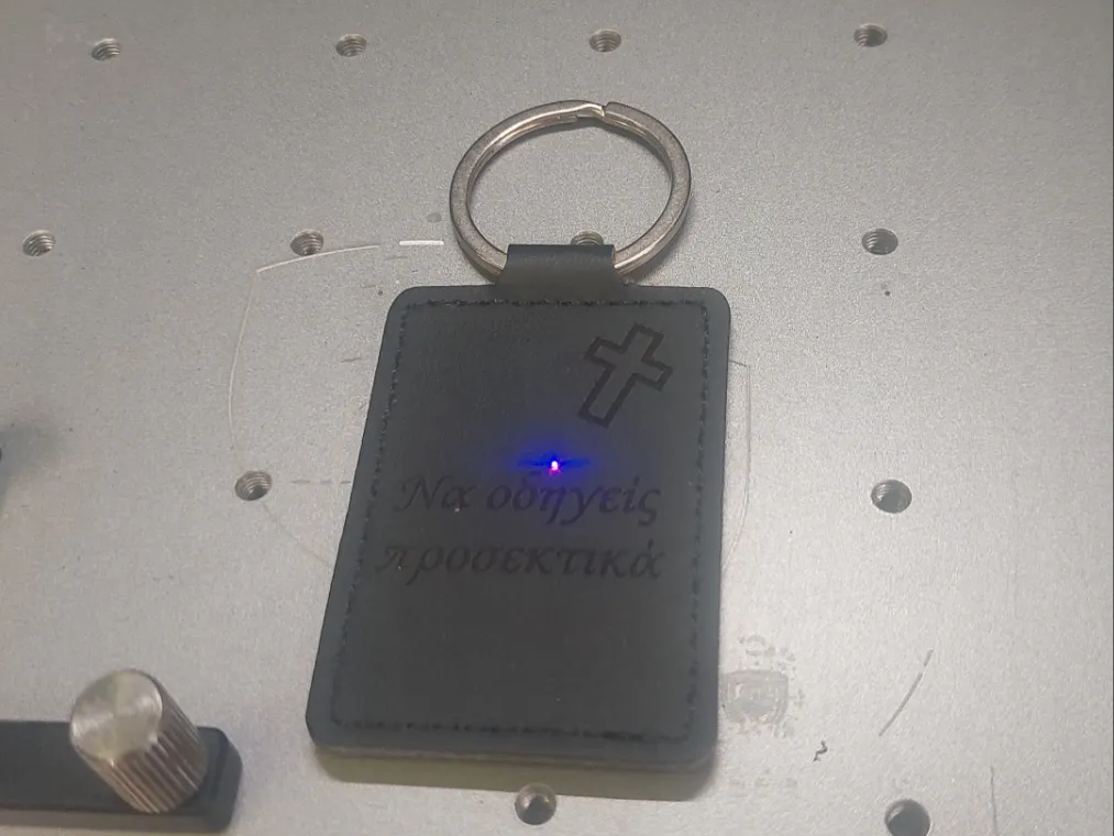 Black Leather Keychain with Cross Motif and Greek Text