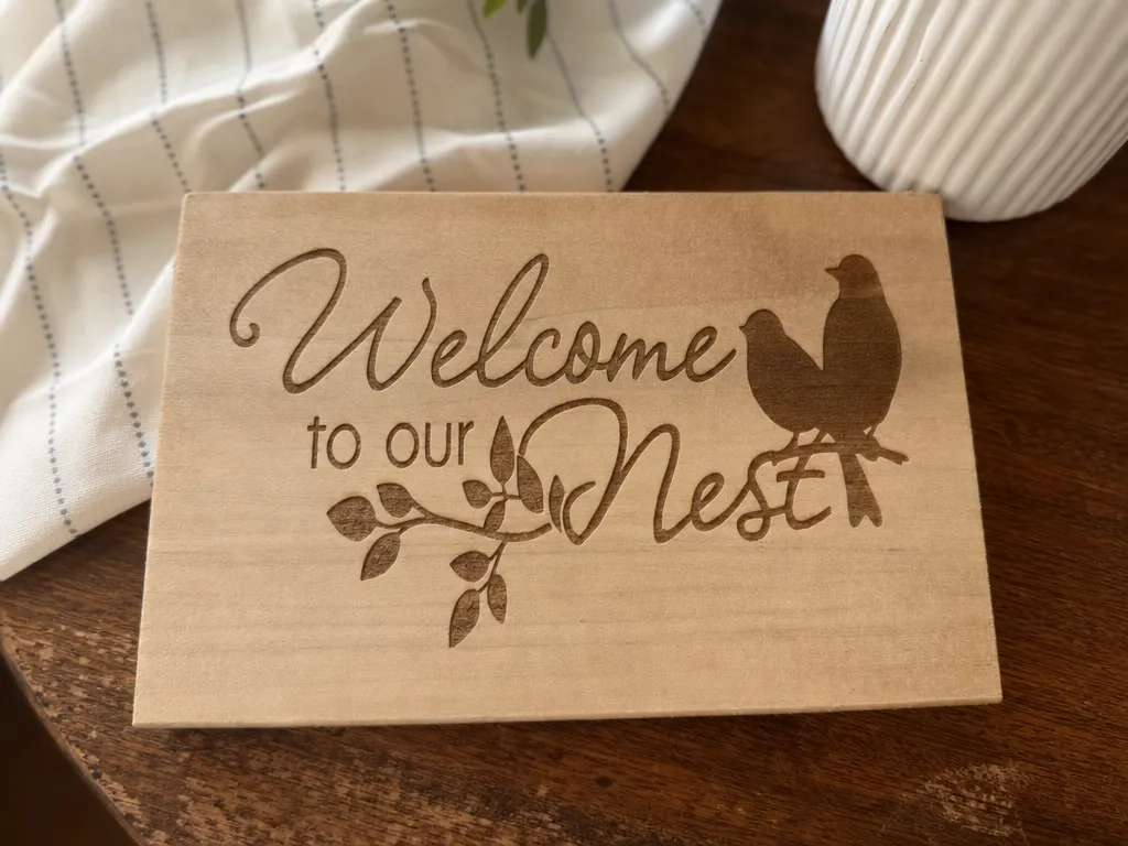Welcome to Our Nest Wooden Sign with Bird and Branch Motif