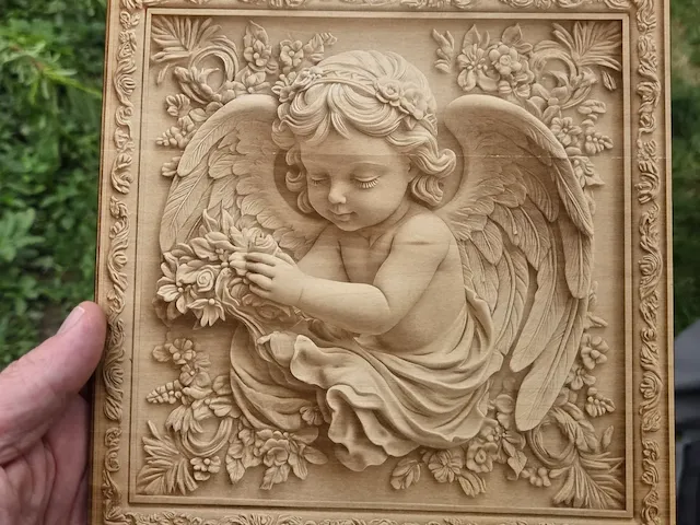 Wooden Wall Plaque Featuring a Cherub Angel with Floral Details