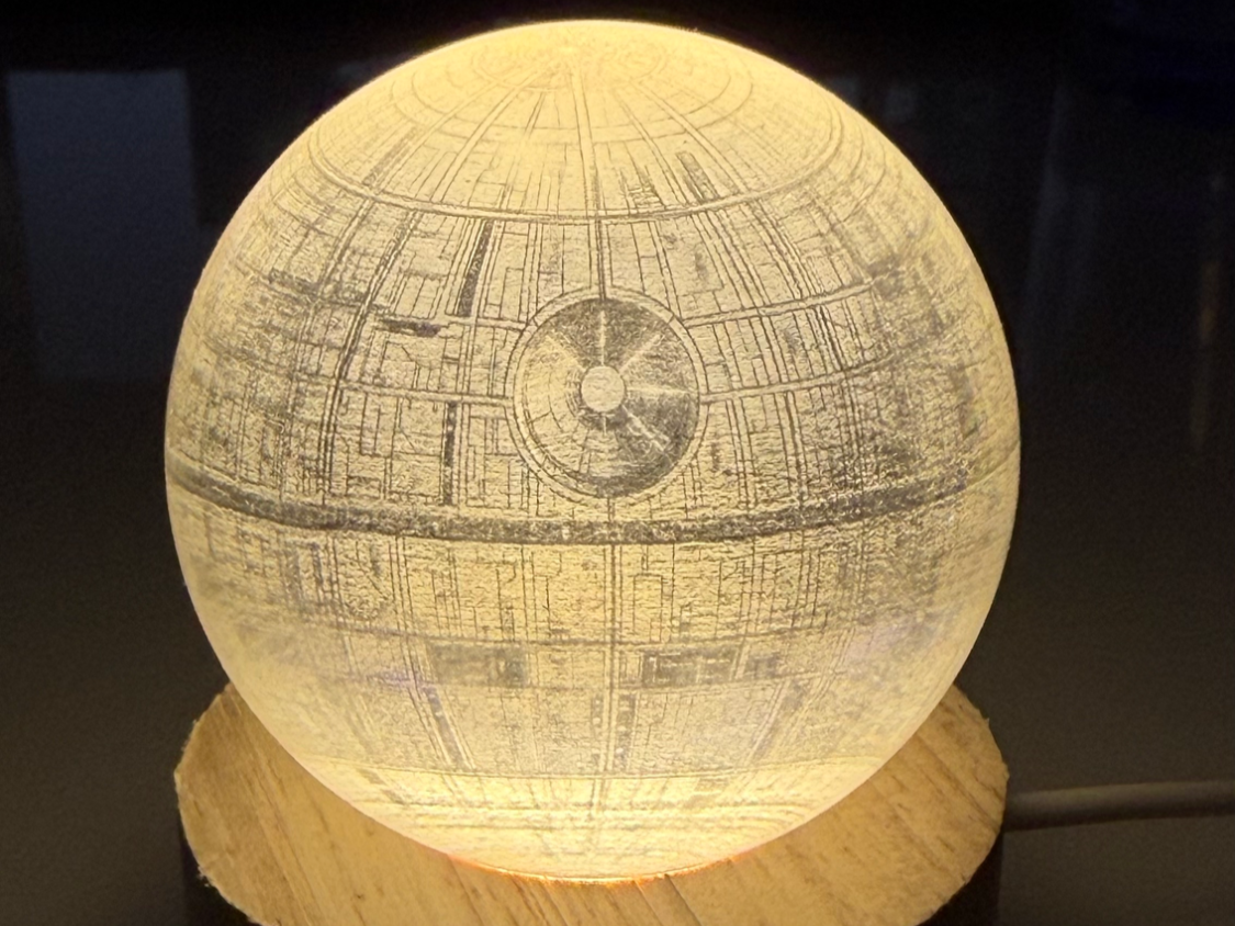 Death Star 60mm sphere (K9 glass).Wood base with LED light.