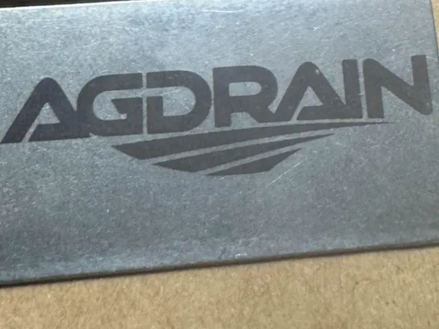 AGDRAIN branded metal identification plate