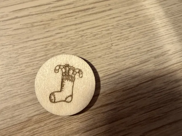 Jeton en bois rond avec motif de chaussette de Noël