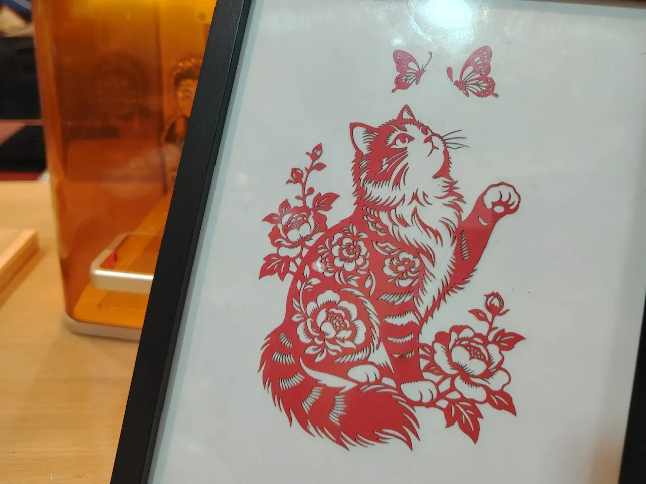 [Laser cut and engrave] Framed Red Paper Cutout Art Featuring a Cat with Flowers and Butterflies