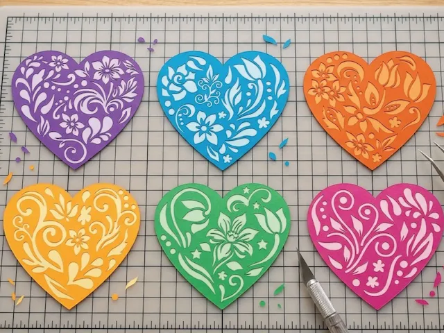 Set of Colorful Floral Heart Cutouts with Intricate Swirl Patterns