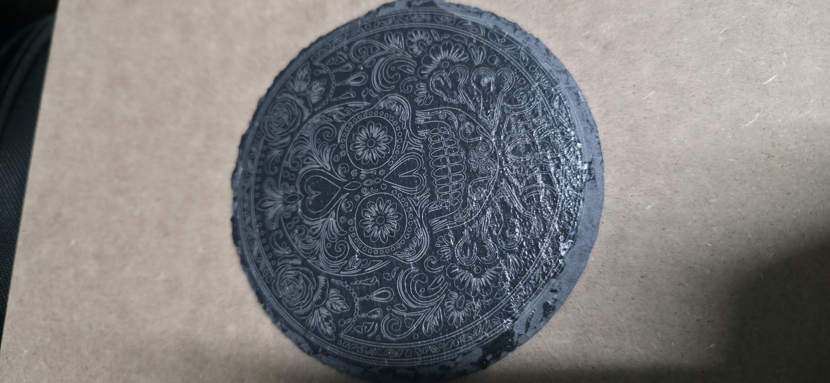 [Laser cut and engrave] Round Slate Coaster Featuring Intricate Floral Sugar Skull Design