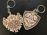 [Laser cut and engrave] Llaveros de madera con personajes de videojuegos en expositor rosa