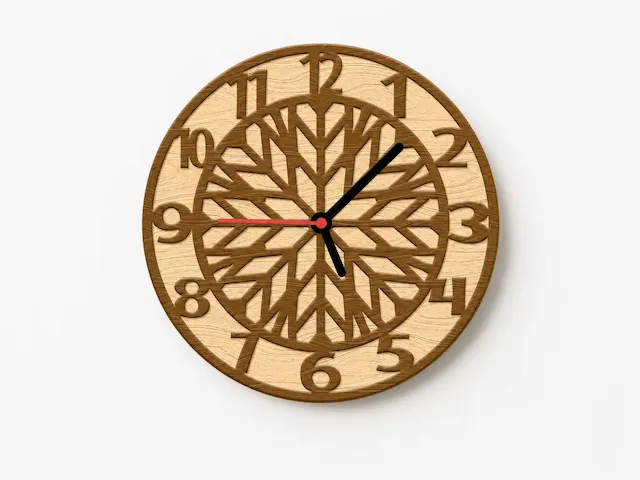 Round wall clock with geometric Mandala pattern and large numerals
