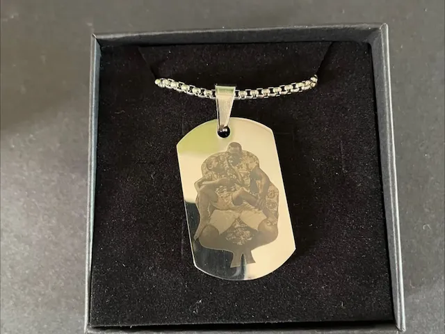 engraved stainless steel pendant