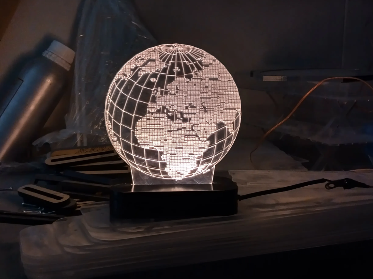 Illuminated Globe Desk Lamp with World Map Silhouette