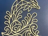 [Laser cut and engrave] Geometric Dolphin Jumping Through Ocean Waves Wall Art