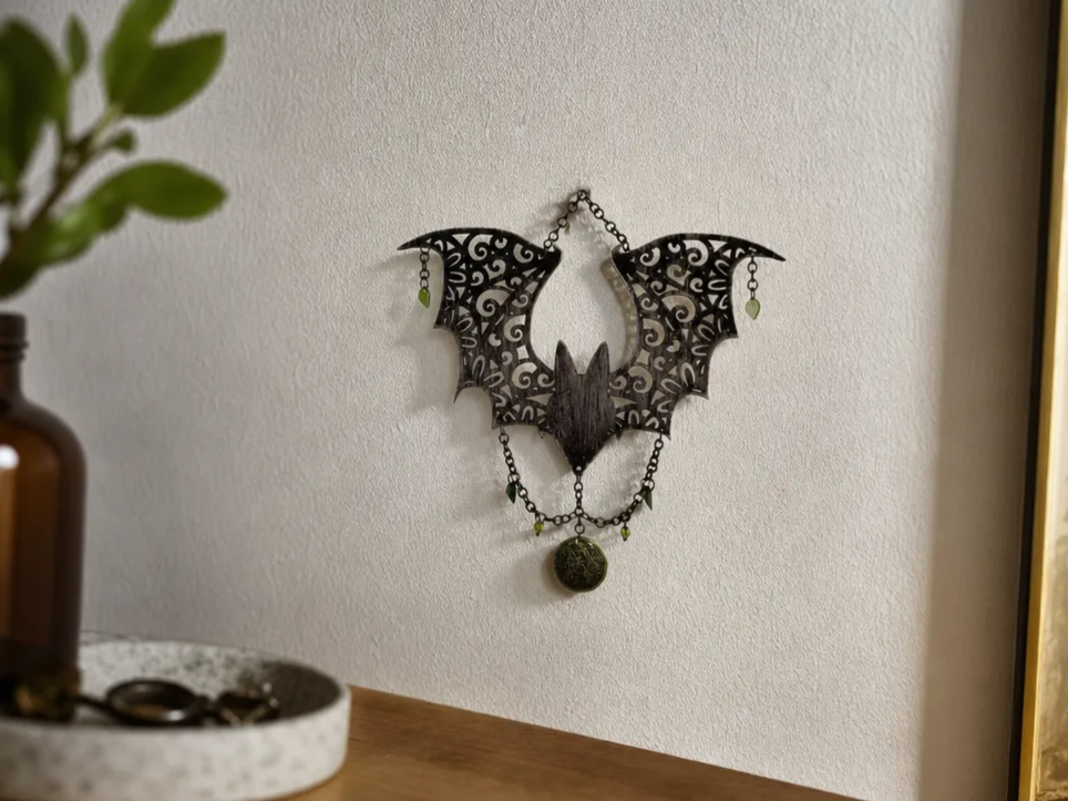 Ornate Bat Wall Hanging with Chain and Green Crystal Accents
