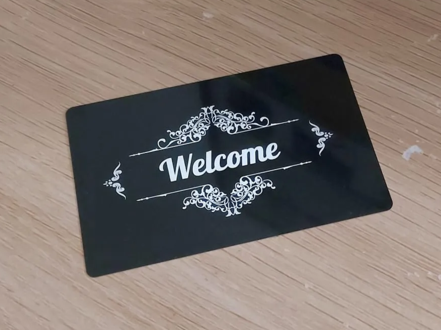 F1 Tutorial - Black Welcome Sign with Ornate Flourish Details