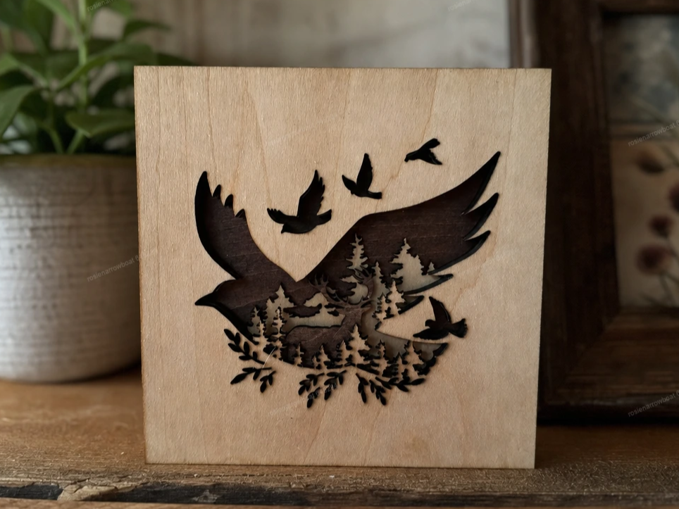 Square Wooden Sign Featuring a Flying Bird and Forest Deer Silhouette
