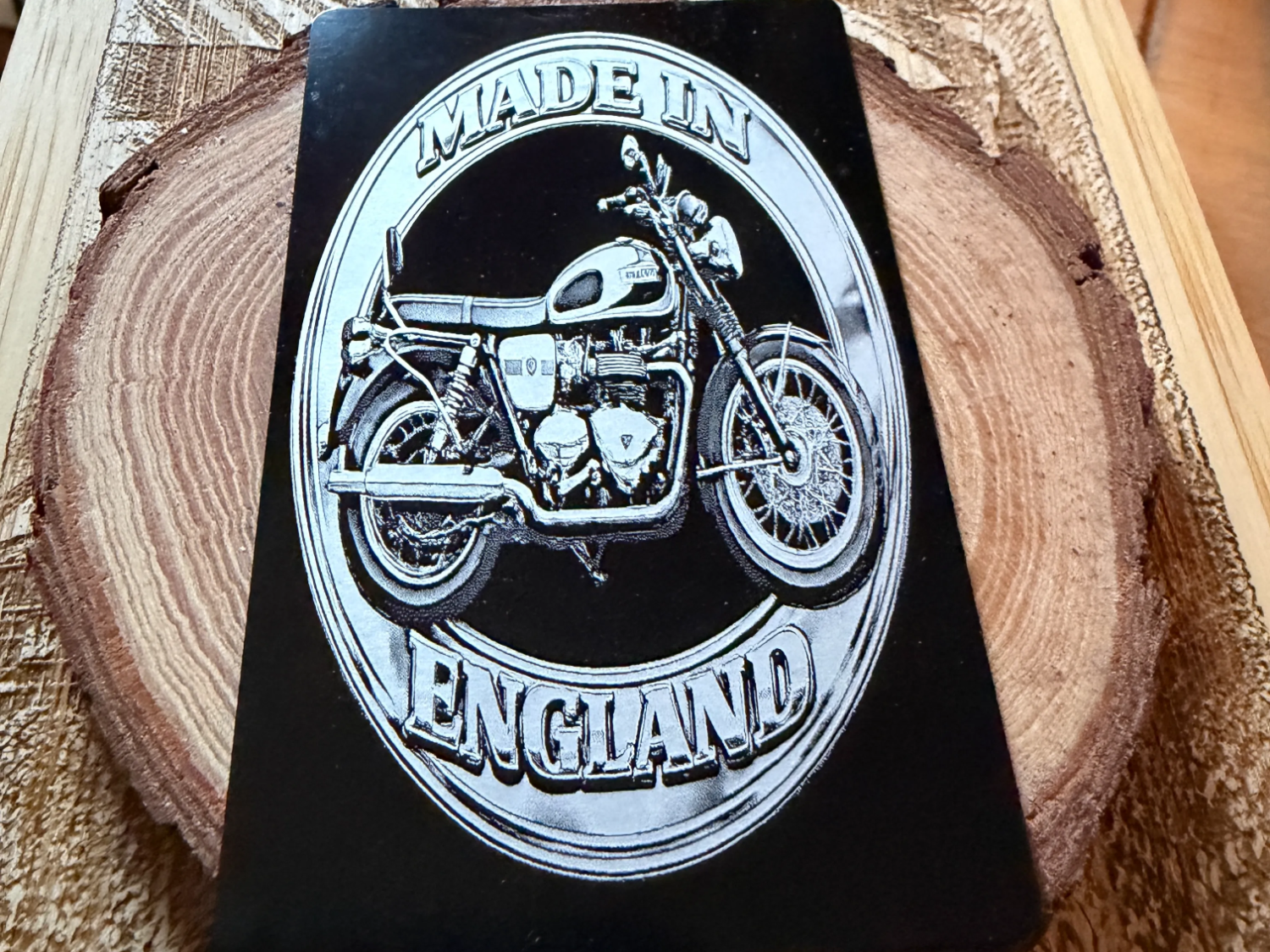 Made in England Triumph motorcycle metal plaque with vintage bike illustration