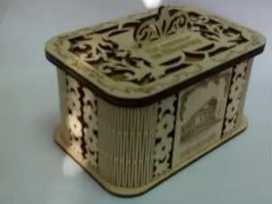 Intricately Detailed Wooden Keepsake Box with Floral Filigree Pattern