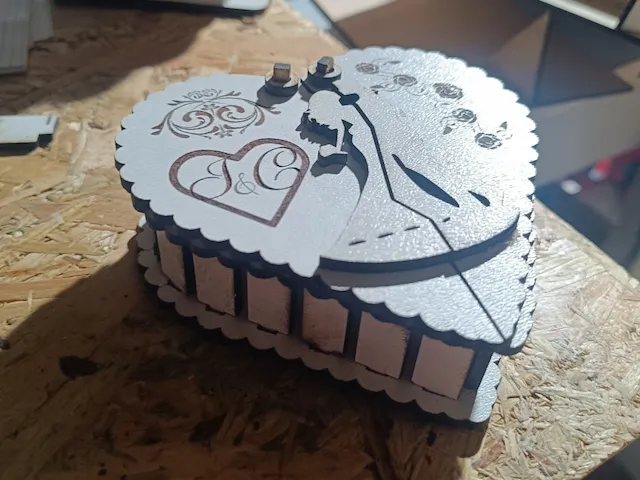 Heart-Shaped Wedding Ring Box with Bride and Groom Silhouette