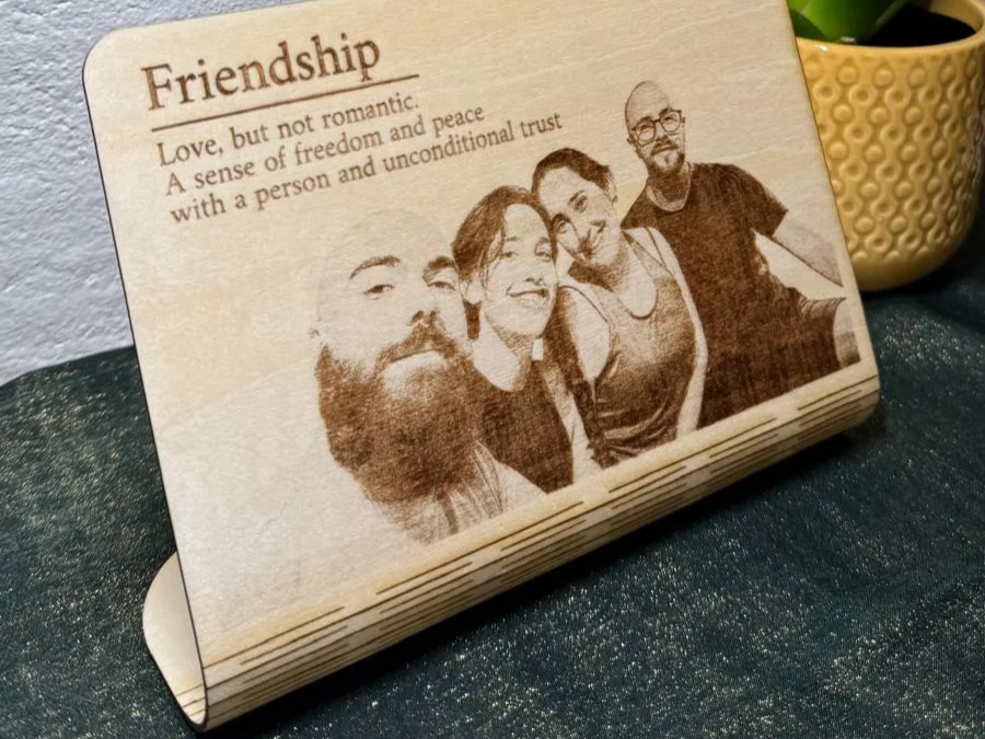 A frame with a flexible stand, all in one piece