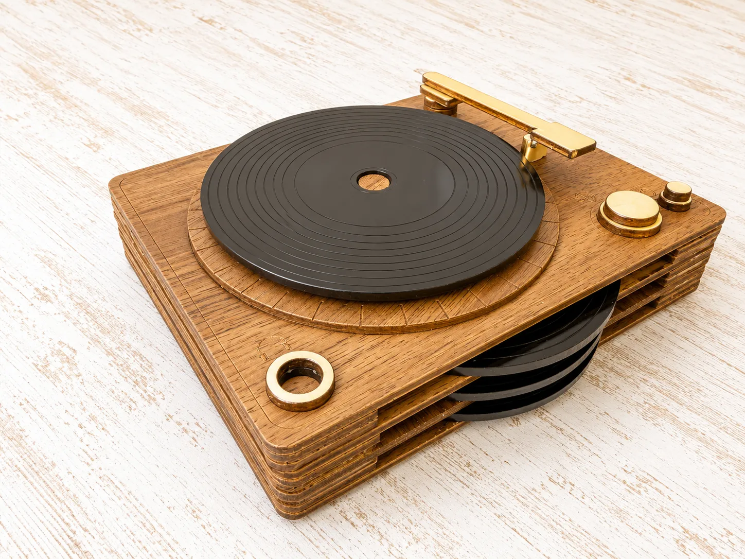 A wooden coaster holder shaped like a vintage record player with vinyl-disc coasters