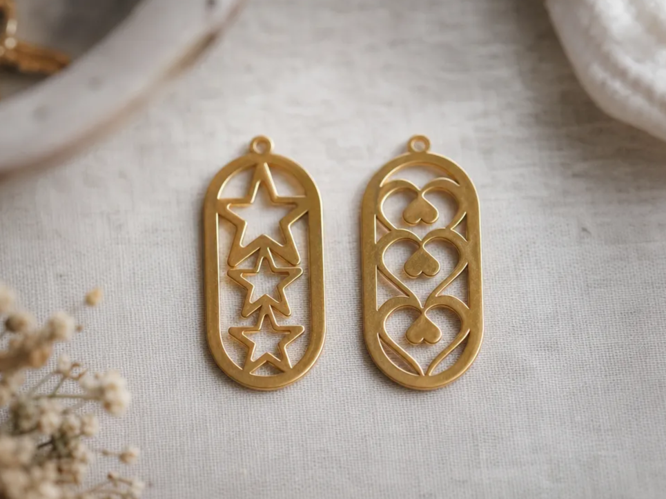 Gold Oval Pendants with Star and Heart Cutout Designs