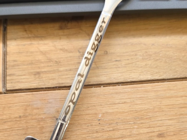 husband polishes opals so made him a spoon for digging in his pots of opals