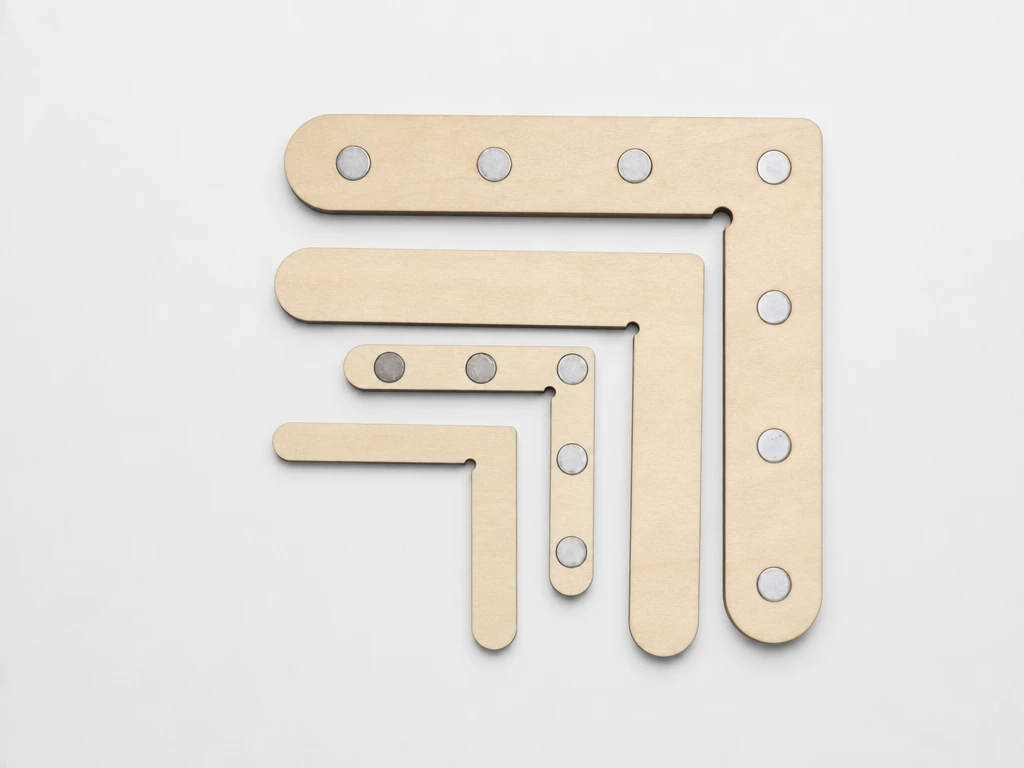 L-shaped magnetic corner alignment squares for laser projects.