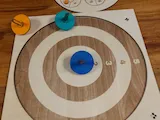 [Laser cut and engrave] Jeu de toupies  en bois avec plateau cible et plateau de comptage serpent
