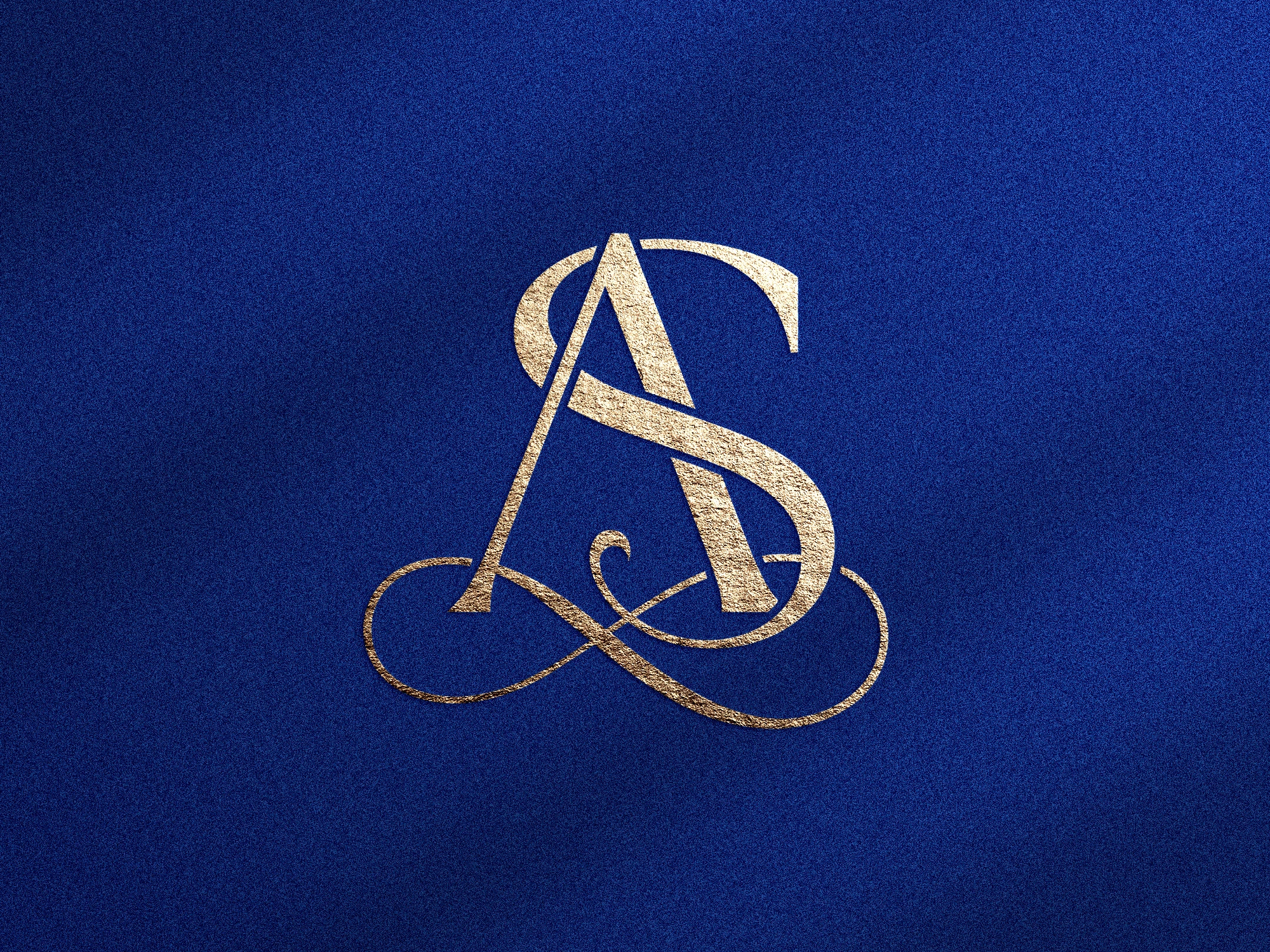 Monogramme doré avec lettres A et S sur fond bleu texturé
