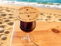 [Laser cut and engrave] Round cork coaster with fly motif and No-Fly Zone text