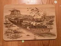 [Laser cut and engrave] Wooden Plaque Featuring a Steam Locomotive in a Desert Landscape